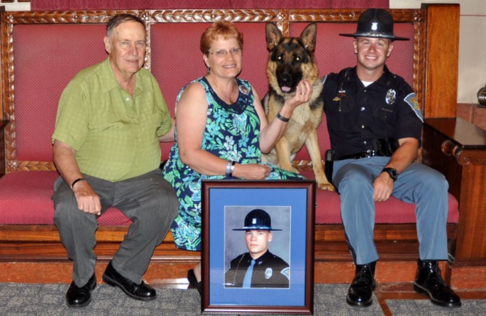Barrett with family of fallen trooper.jpg