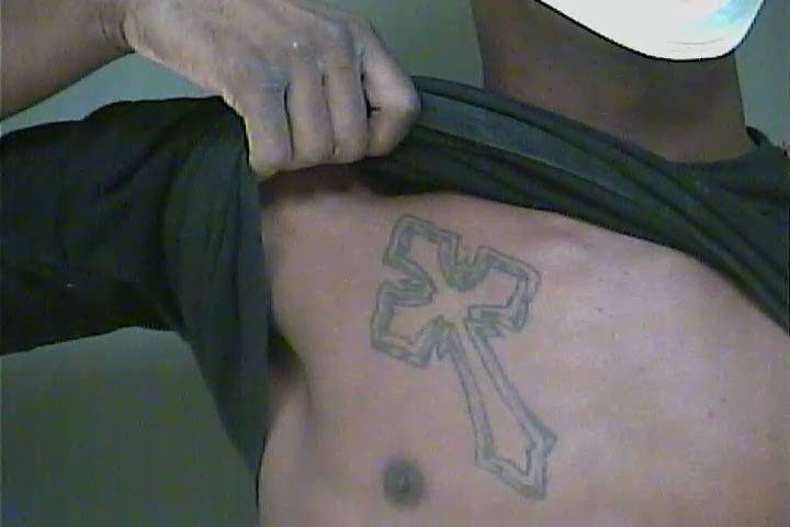 Tyrell Deshawn White tattoo HCSD Booking Photo.jpg