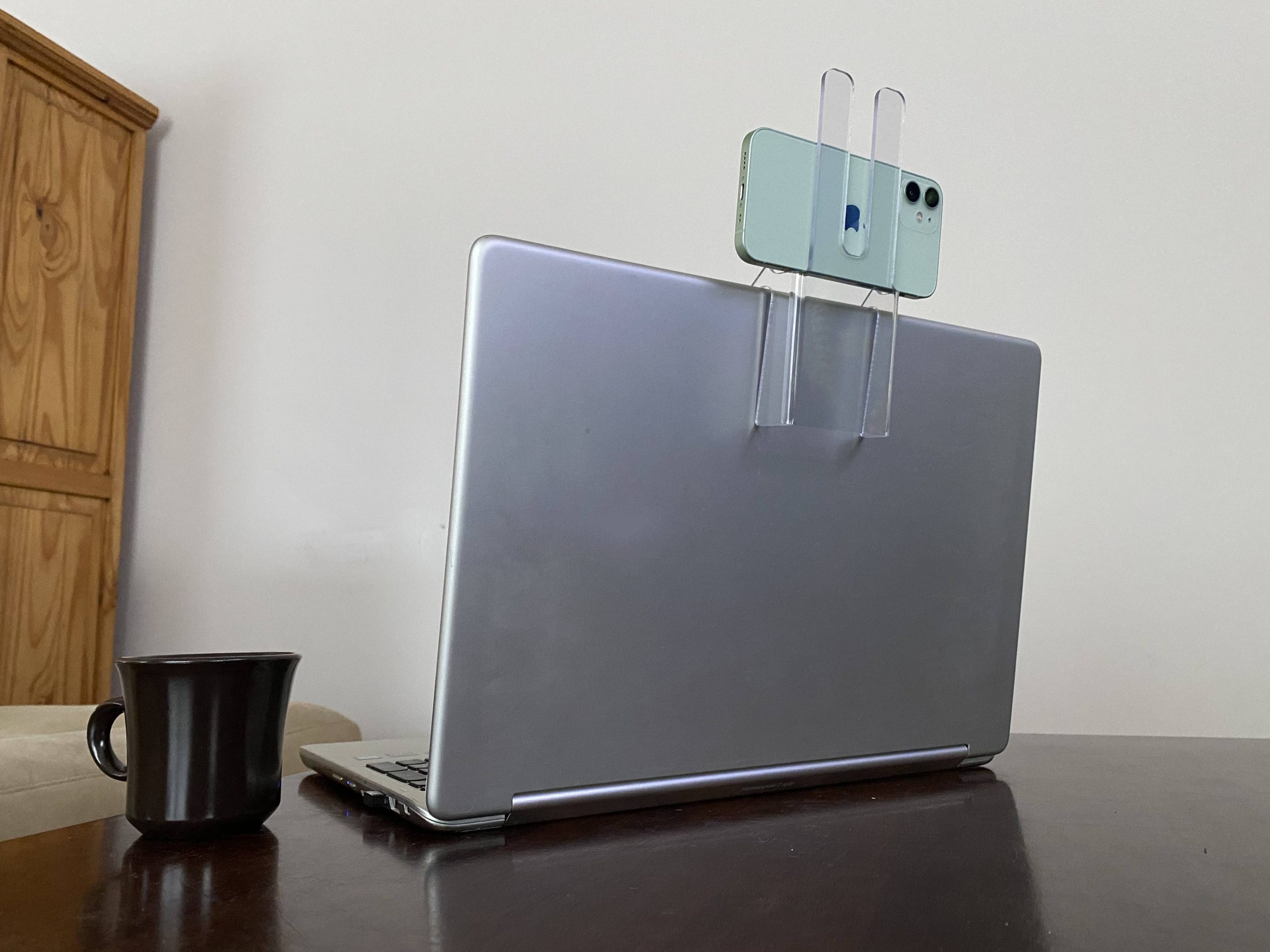 The mount simply goes over your screen and you can safely place your phone on the mount.