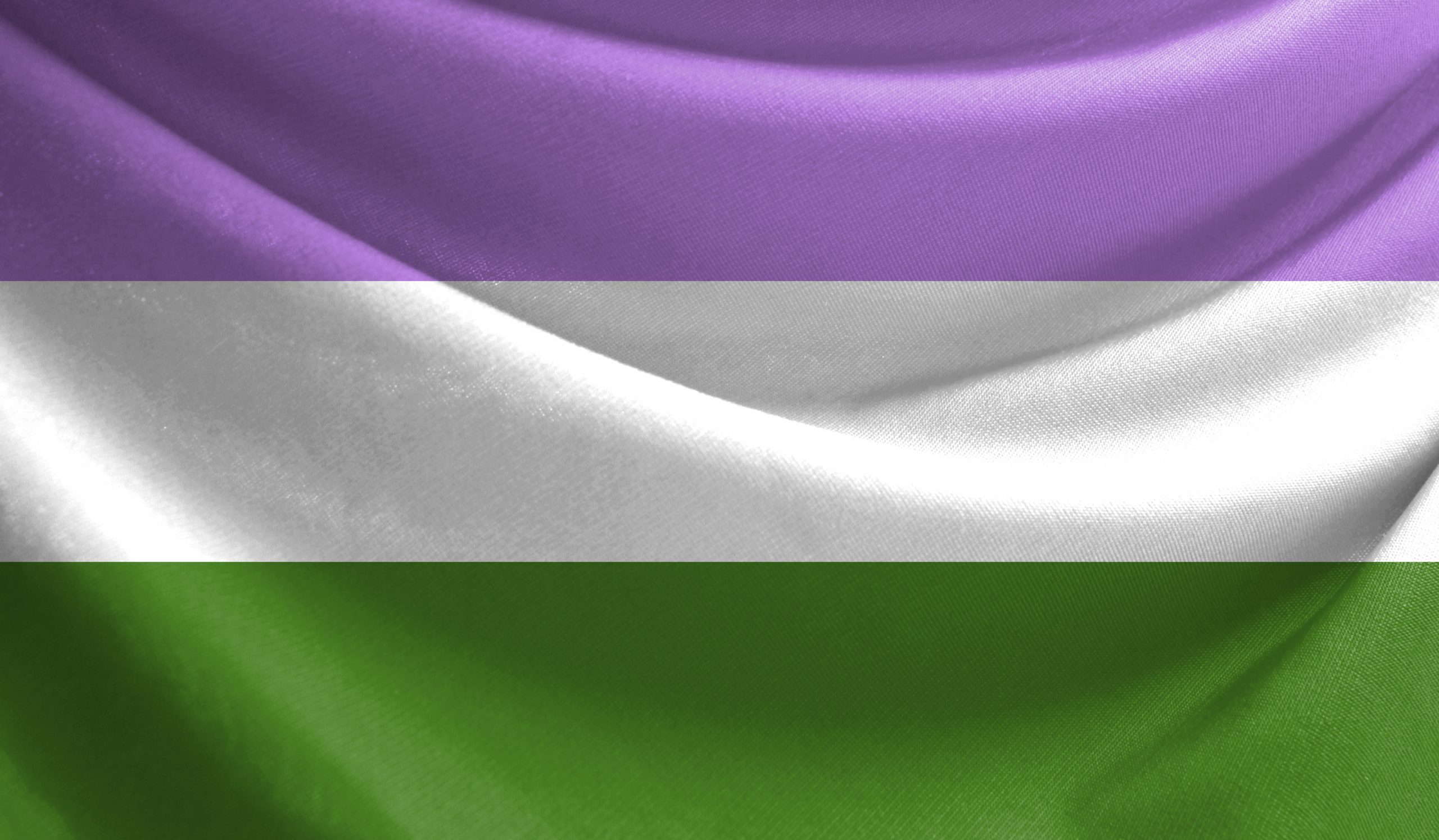 Realistic,Flag,Of,Genderqueer,Pride,On,The,Wavy,Surface,Of