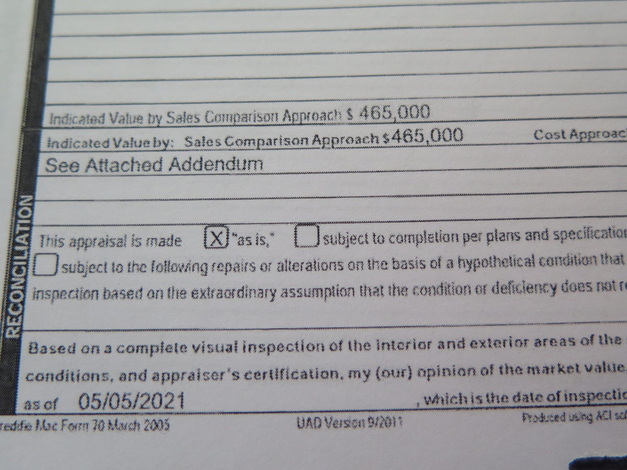 This page from a May 5, 2021, appraisal of the Parkers' Loveland home shows a value of $465,000.