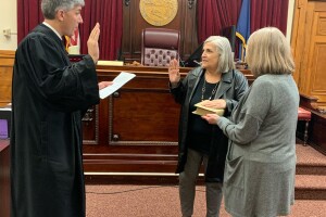 Patricia Russell is sworn into the office of Mayor Wednesday.