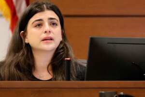 State witness Brittany Sinitch, a teacher at Marjory Stoneman Douglas High School, cries during direct examination in the penalty trial of Nikolas Cruz at the Broward County Courthouse in Fort Lauderdale on Monday, July 18, 2022.  