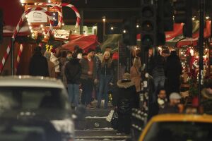 Actor Leslie Grace, centre, on what is believed to be the film set of the new Batgirl movie, in Glasgow, Scotland, Thursday, Jan. 13, 2022. (Andrew Milligan/PA via AP)