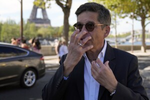 French Emergency Doctor Frederic Maillez, who was first to arrive at the scene of the crash that killed Britain's Diana, Princess of Wales, speaks to The Associated Press, next to the Pont de l'Alma tunnel, in Paris, Wednesday, Aug. 24, 2022. It has been nearly 25 years since Princess Diana died in a high-speed car crash in Paris. The French doctor who treated her at the scene has recounted what happened. Dr. Frederic Mailliez told The Associated Press how he tried to save her on that night of Aug. 31, 1997. (AP Photo/Francois Mori)
