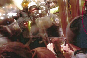 mazza holding open door.png