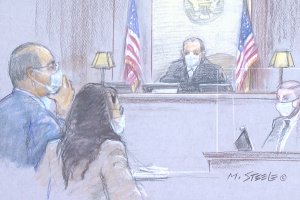 Convicted Chinese spymaster Yanjun Xu listens to testimony with help from Mandarin interpreter during his trial in 2021 