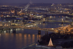 Evening aerial shot of Pittsburgh downtown with Christmas tree