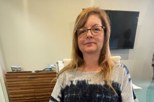 Peggy Claar of New Castle has undergone 15 surgeries in four years and uses a cane to walk.