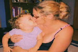 Judah Morgan and his foster mother Jenna Hullett.  Judah died in October 2021 after suffering blunt force trauma.  His birth parents are charged in connection with Judah's death.