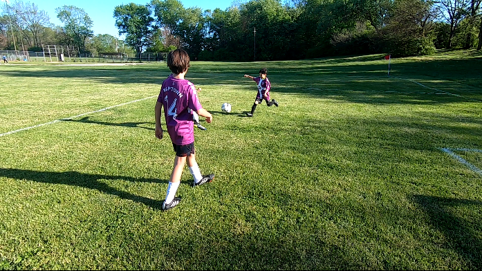 kids playing soccer.PNG