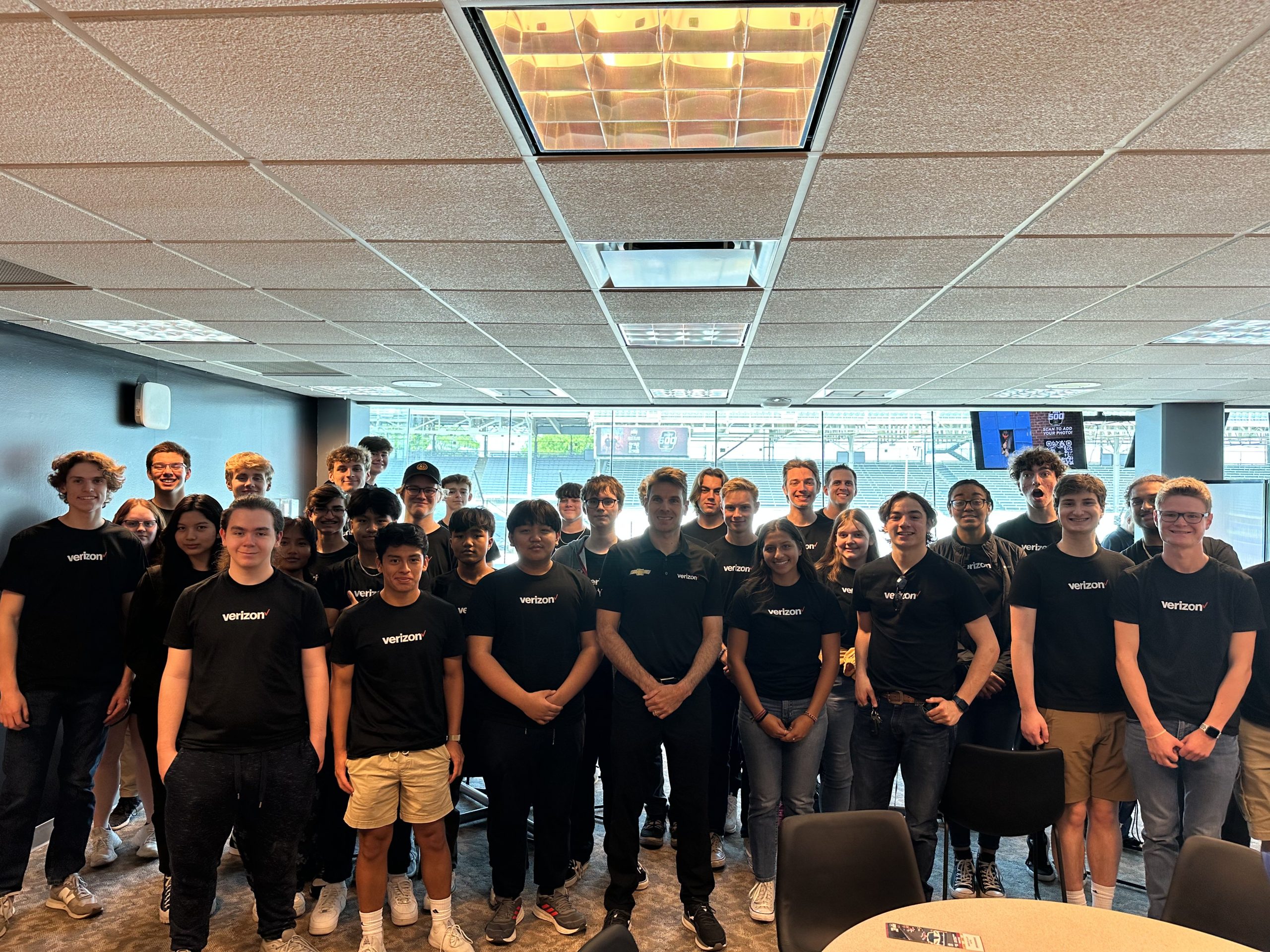 Team_Penske's_Will_Power_with_Students.jpg
