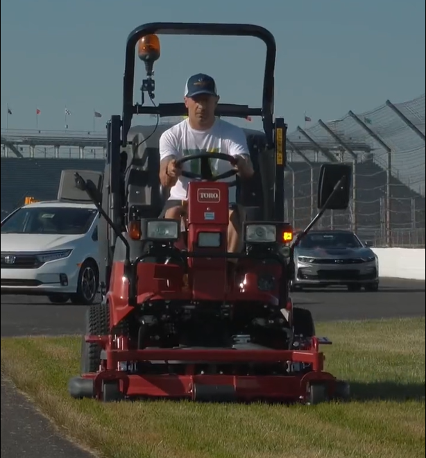 Kanaan cutting grass.PNG