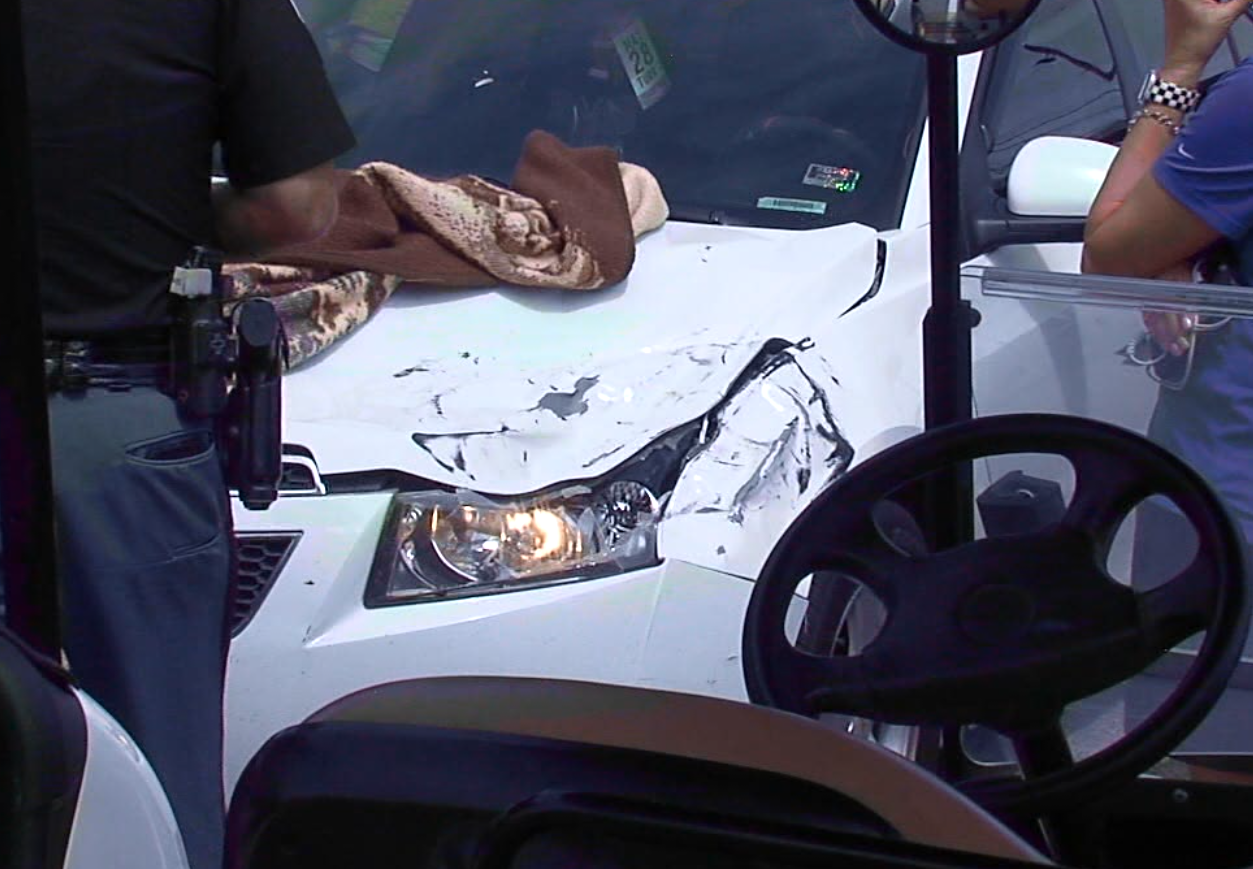Car struck by flying IndyCar tire