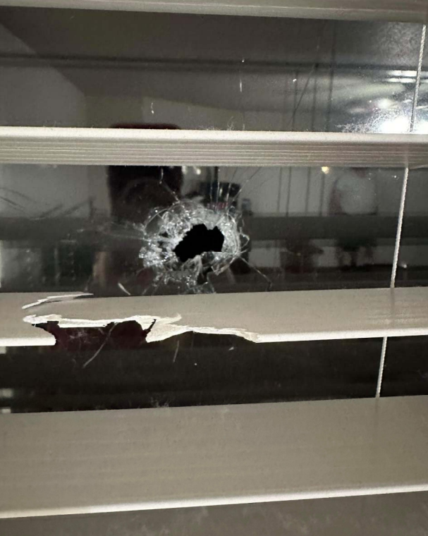 Hammons party bullet hole