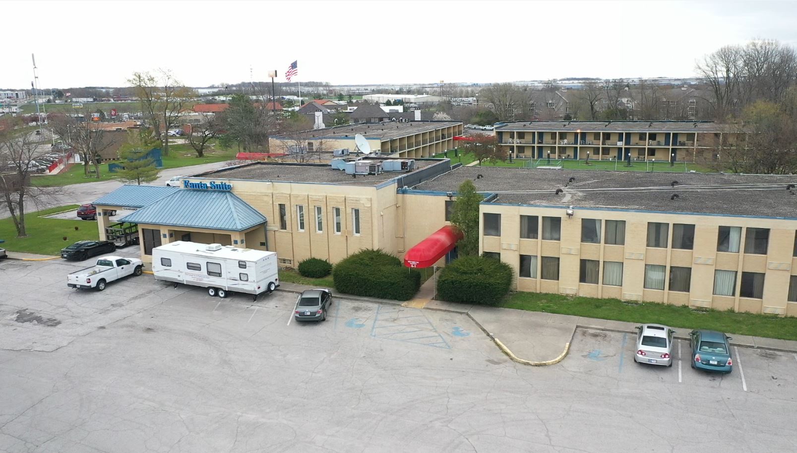 The owner of a troubled Greenwood hotel, the Red Carpet Inn and Fanta Suites, is selling the property, according to court records.

