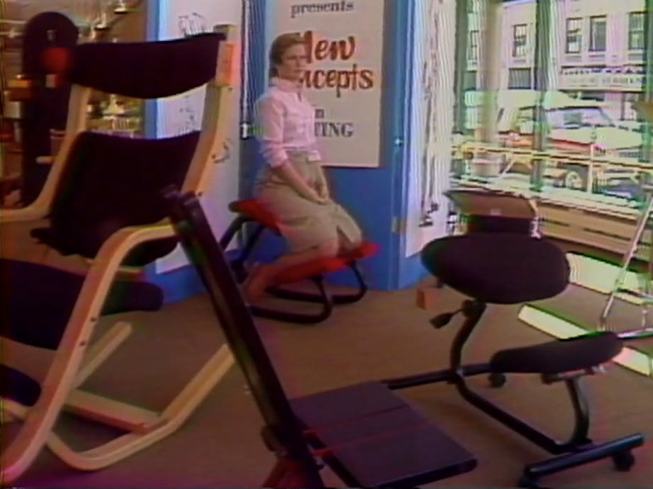 Woman sits in new style chair