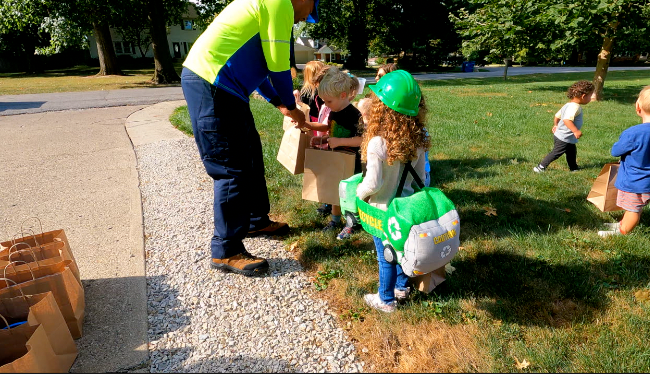 Handing out swag 