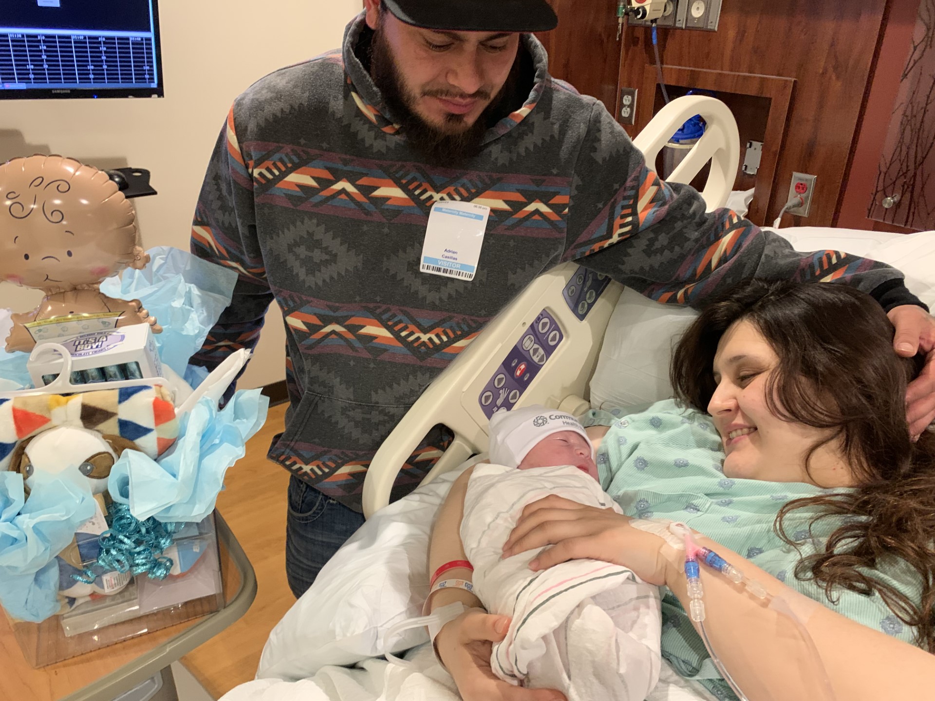 CHS New Years baby 2024 baby mom and dad.jpg