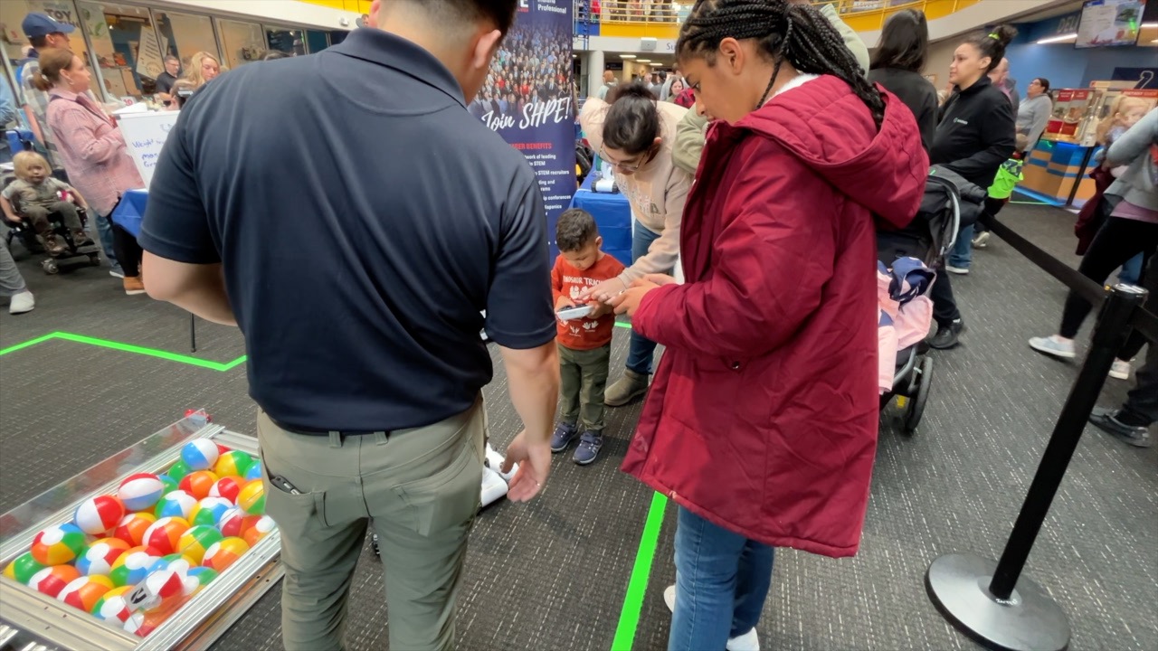 TEEN WITH FAMILY AT ENGINEERS DAY.jpg