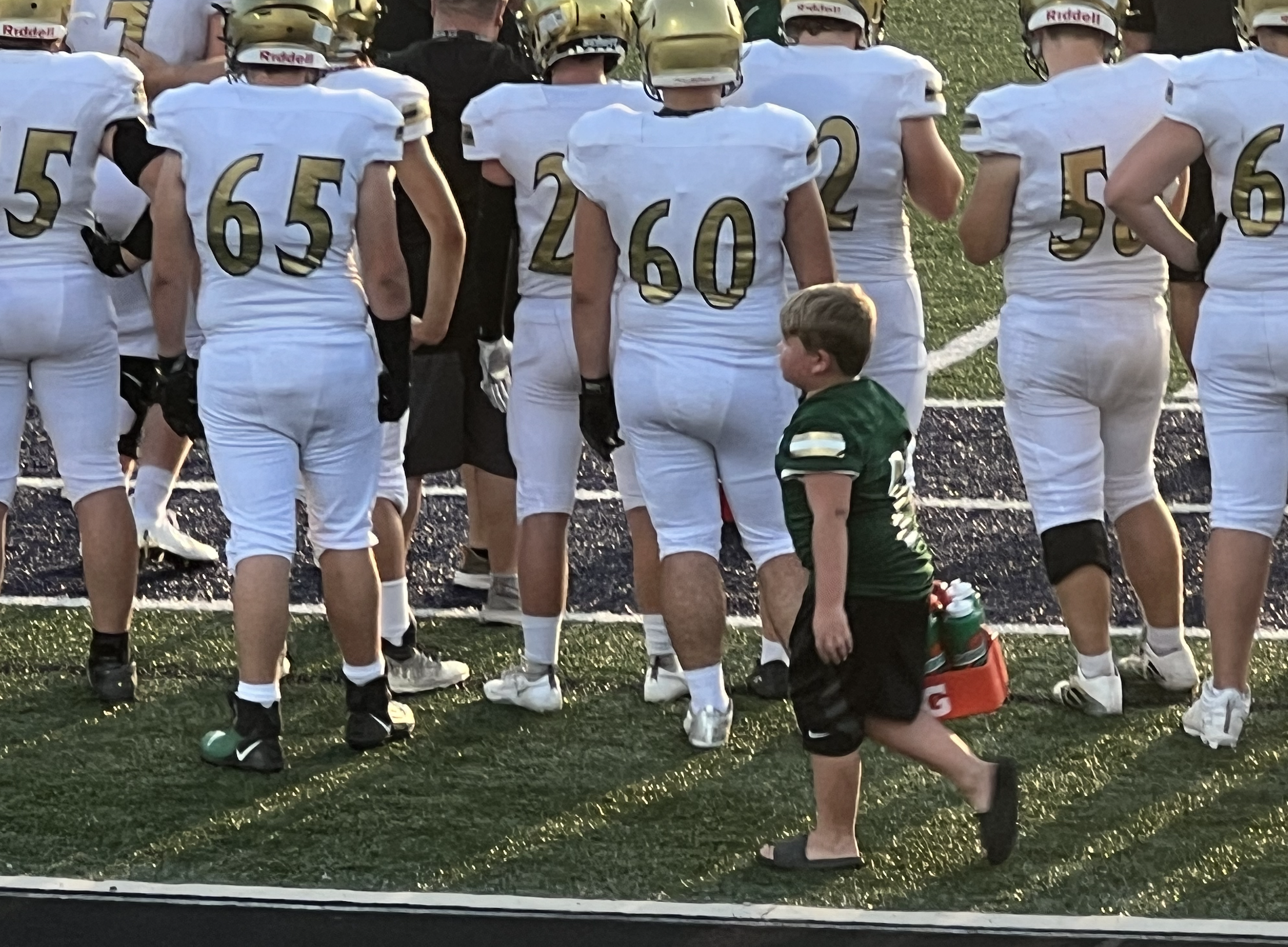 Griffin helping the Eastern High School Varsity Football Team 