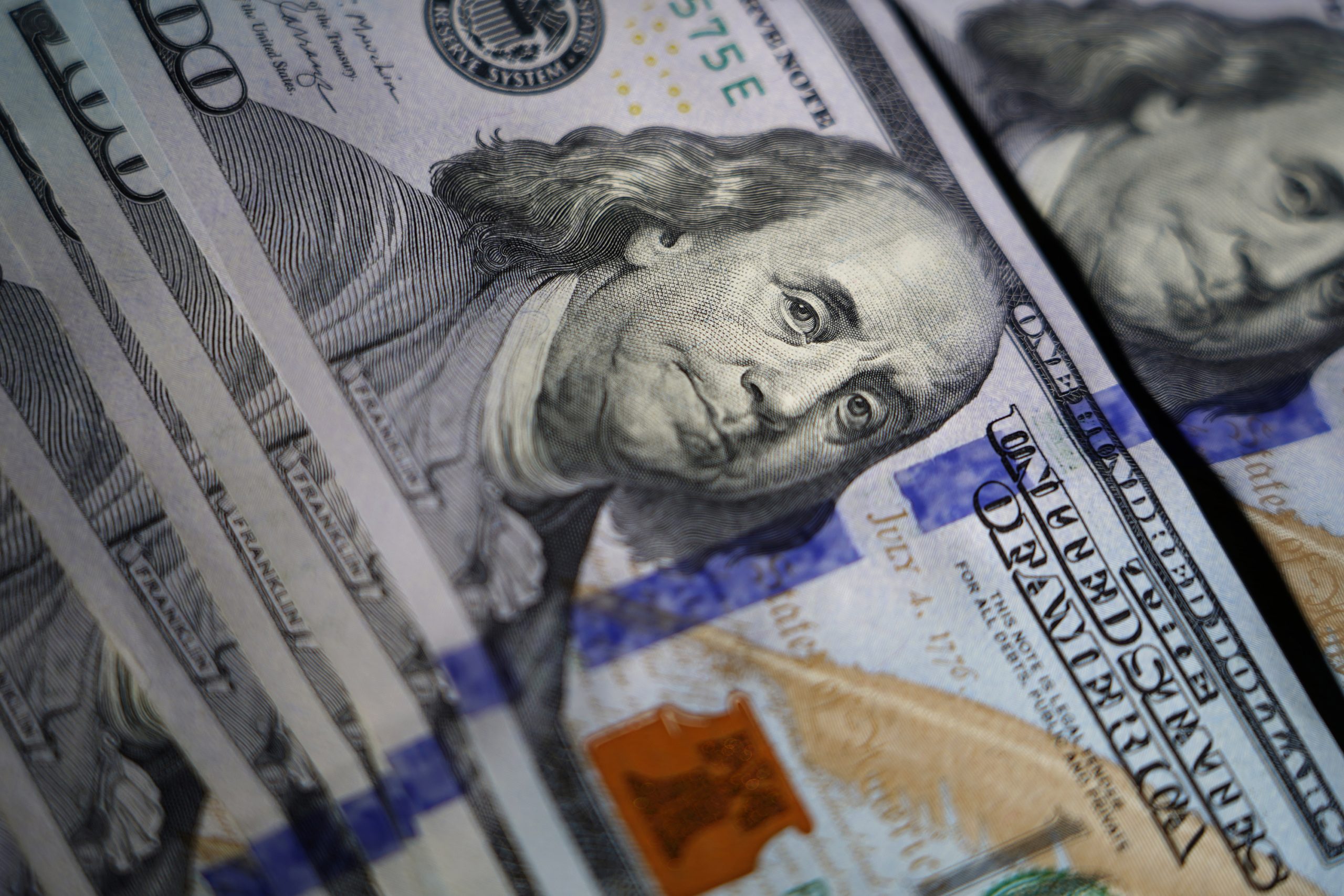 The likeness of Benjamin Franklin is seen on U.S. $100 bills.