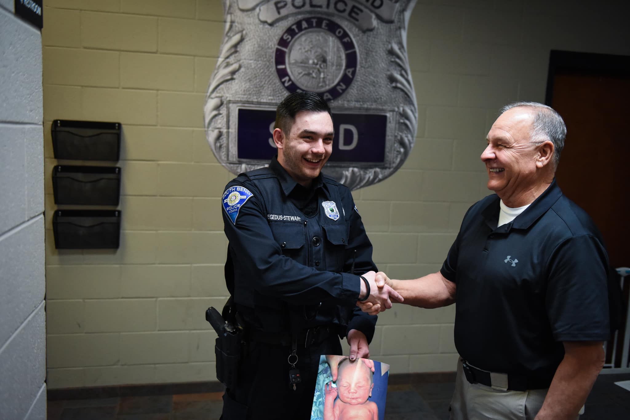 South Bend Police Officer Matthew Hegedus-Stewart and retired Lt. Gene Eyster.