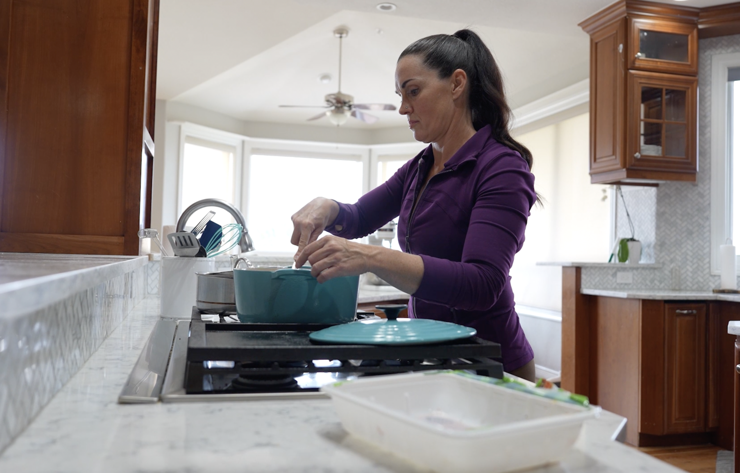 Stay-at-home mom Corrine Christian cooking.