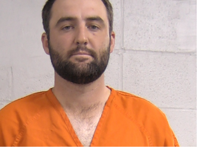 Mugshot of golfer Scottie Scheffler.