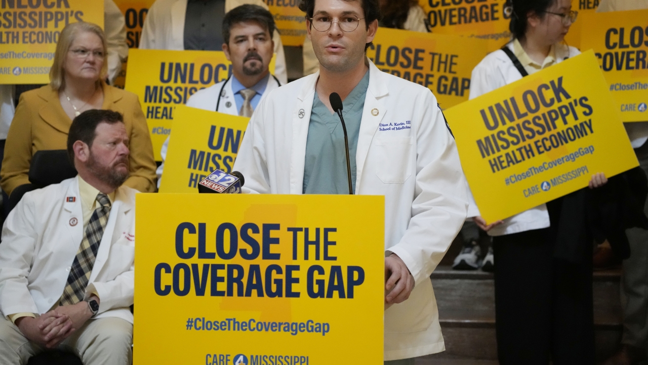 A student speaks about his concerns for providing greater accessibility for affordable and better health care to residents
