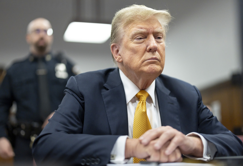 Former President Donald Trump sits in Manhattan criminal court