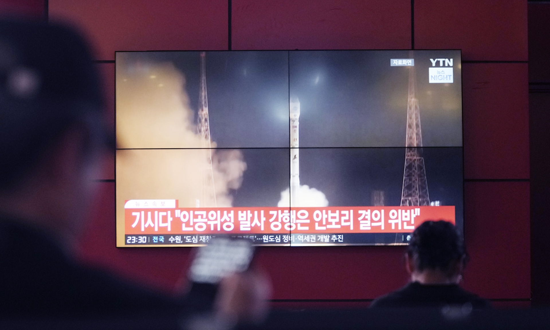 A TV screen in South Korea shows a file image of a North Korean rocket launch on Monday, May 27, 2024.