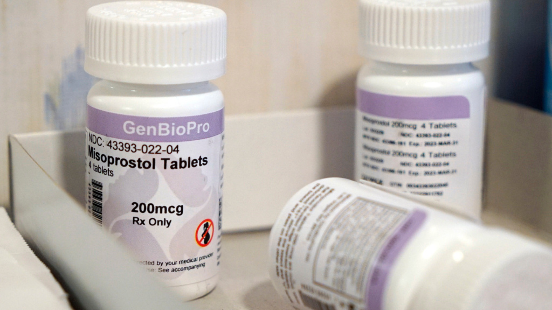 Bottles of the drug misoprostol sit on a table