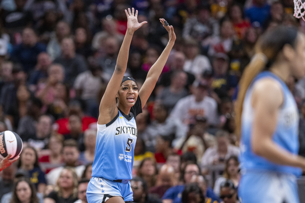 Chicago Sky forward Angel Reese (5) reacts after being called for a foul