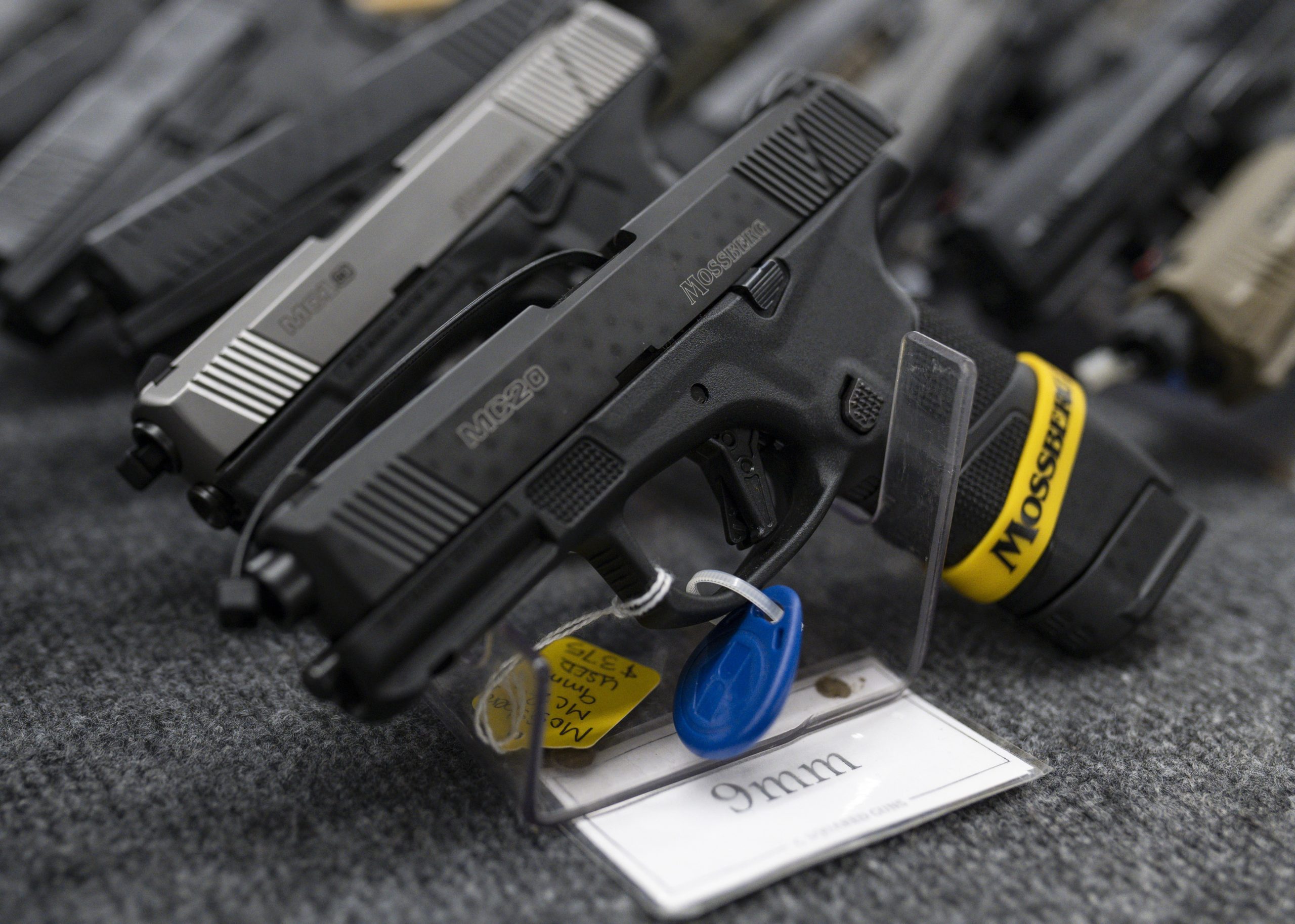 Pistols sit on display