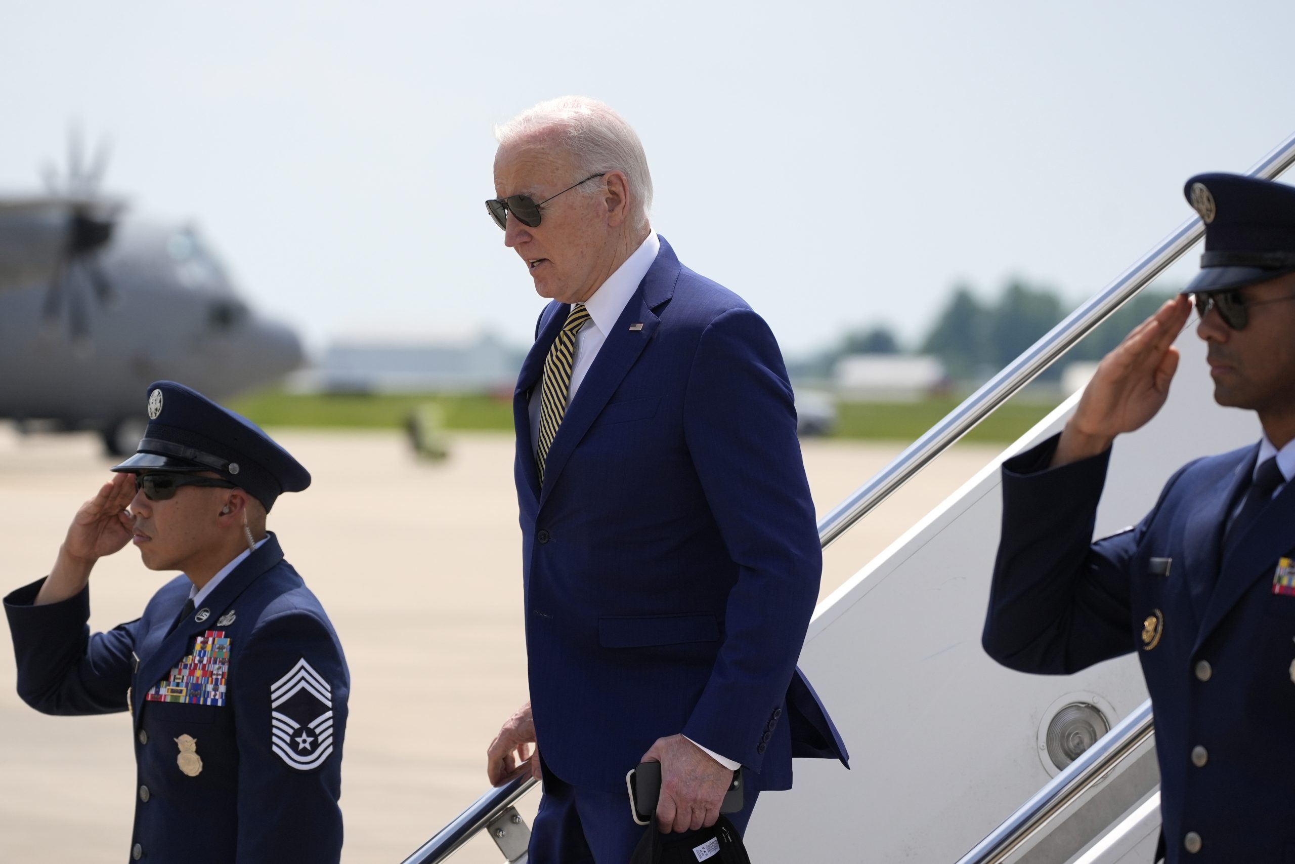 President Joe Biden arrives on Air Force One at Delaware Air National Guard Base.
