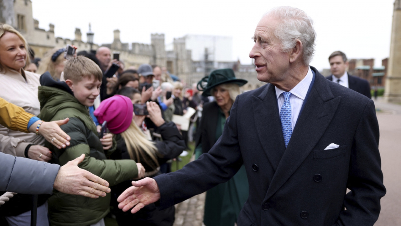 Britain's King Charles III and Queen Camilla greet people after attending the Easter Matins Service at St. George's Chapel.