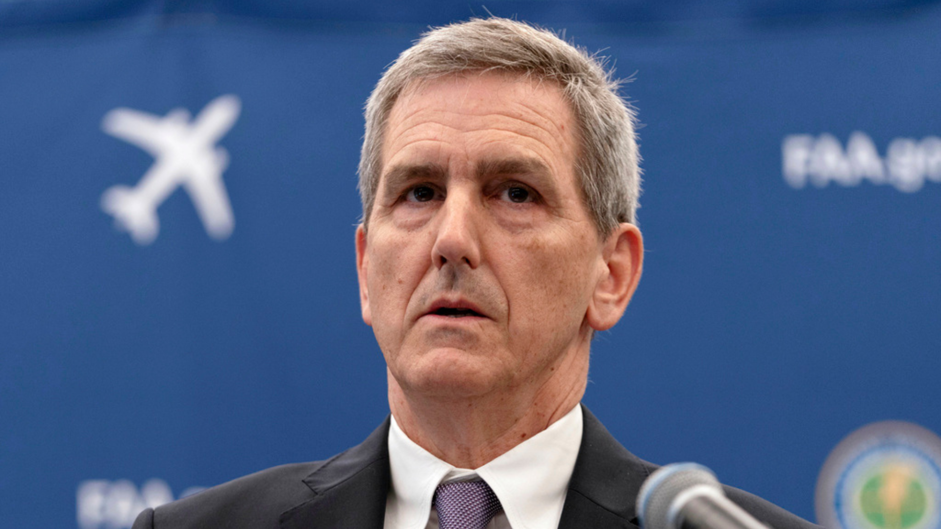 FAA Administrator Mike Whitaker speaks at a news conference at FAA headquarters in Washington.