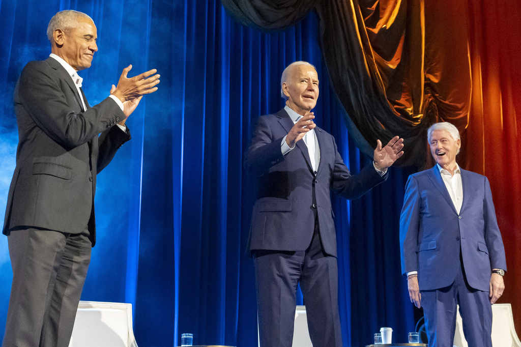 President Joe Biden, center, and former presidents Barack Obama, left, and Bill Clinton participate in a fundraising event, March 28, 2024, in New York.