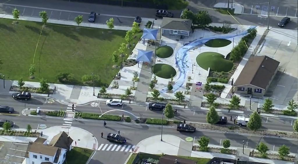 Police respond to the scene of a shooting at the Brooklands Plaza Splash Pad, 