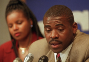 File photo of Dallas Cowboys receiver Michael Irvin, and his wife Sandy, July 16, 1996.