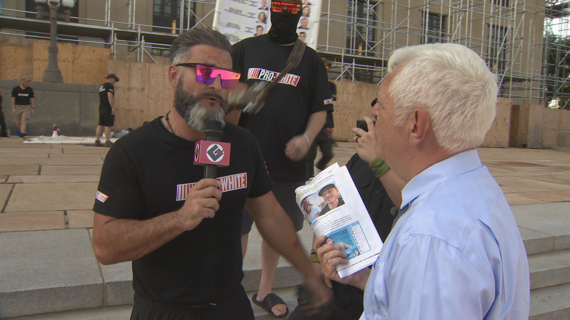 Phil Williams confront Jon Minado with pedophile pic (1).jpeg