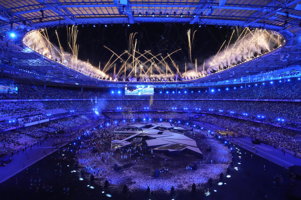 Fireworks explode during the 2024 Summer Olympics closing ceremony.