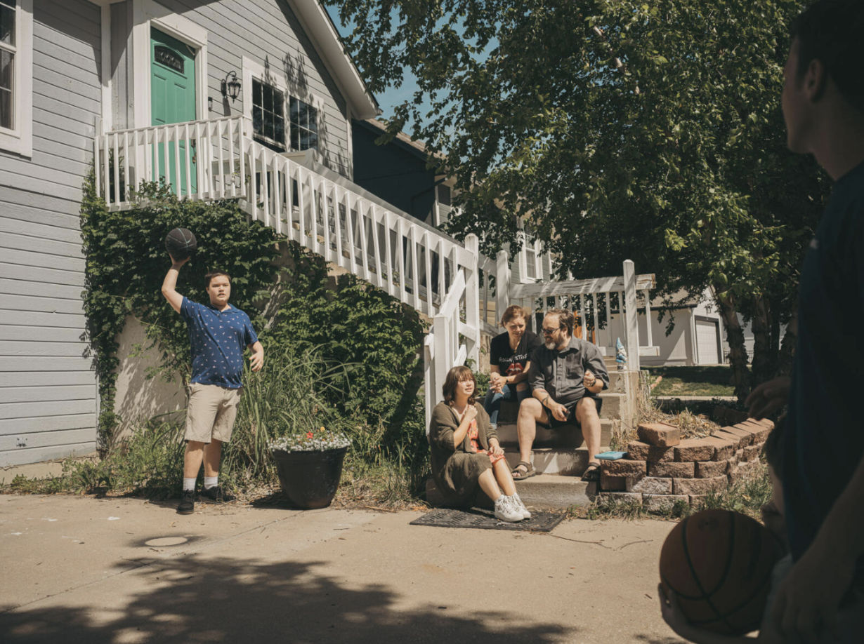 Jessica Patterson at home with her husband and four kids in Olathe, Kansas.