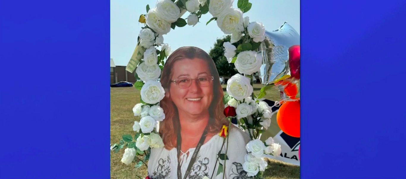 Christina Irimie is seen in a photo honoring her life after she was killed in a Georgia school shooting