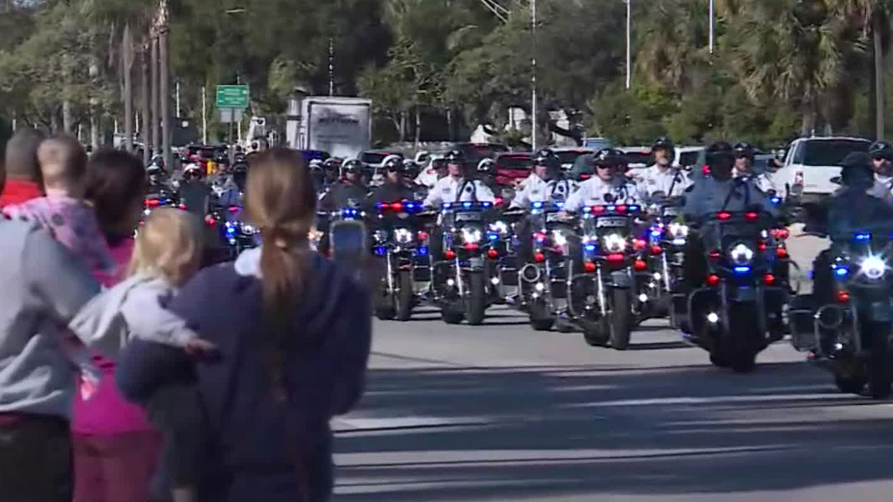 The public lined streets to honor the lives of three fallen deputies ahead of a memorial service at the South Florida Fairgrounds on Dec. 3, 2024.
