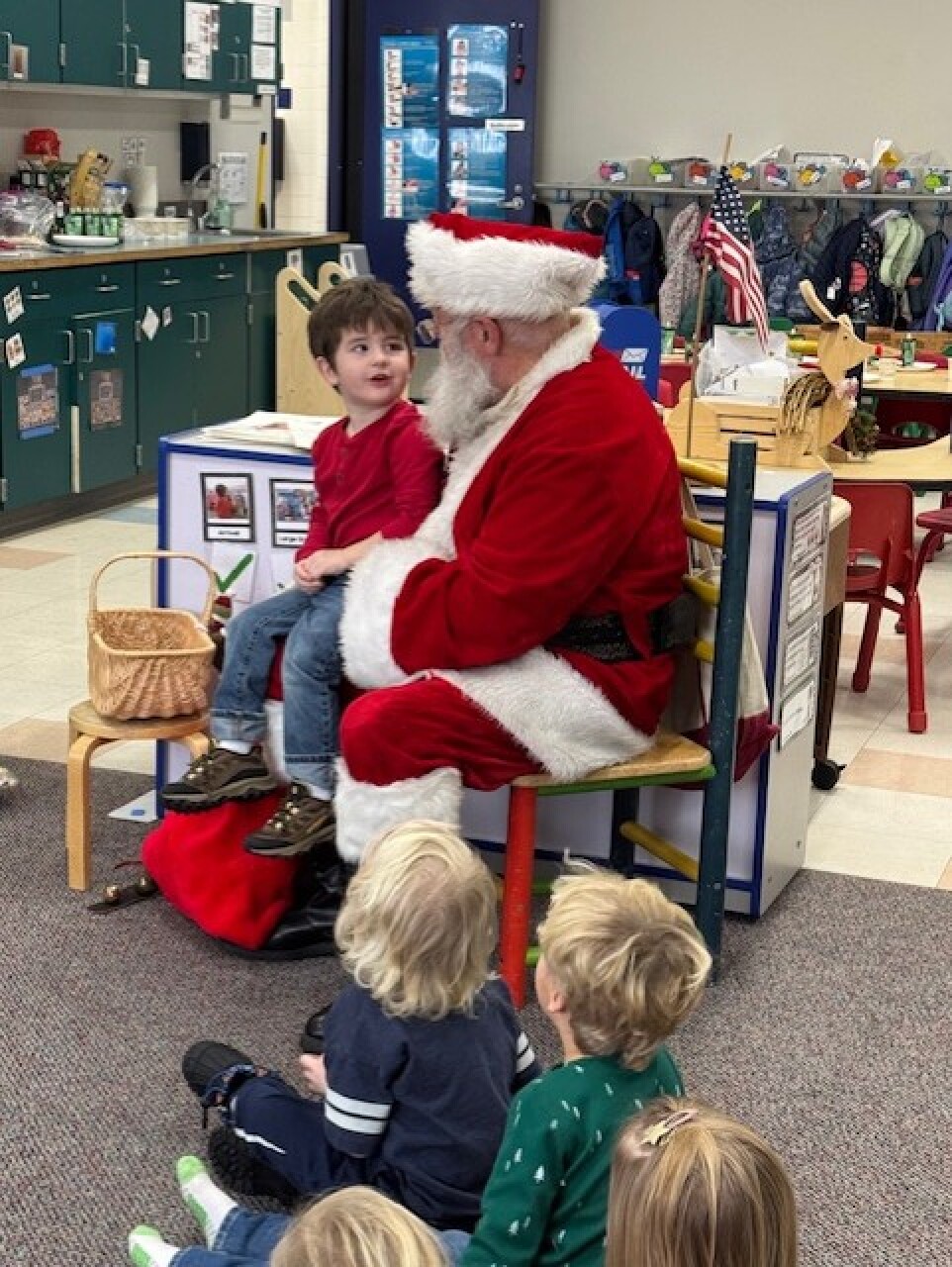 Garrett Veihl — dressed as Santa Clause — makes an appearance at a Michigan preschool.