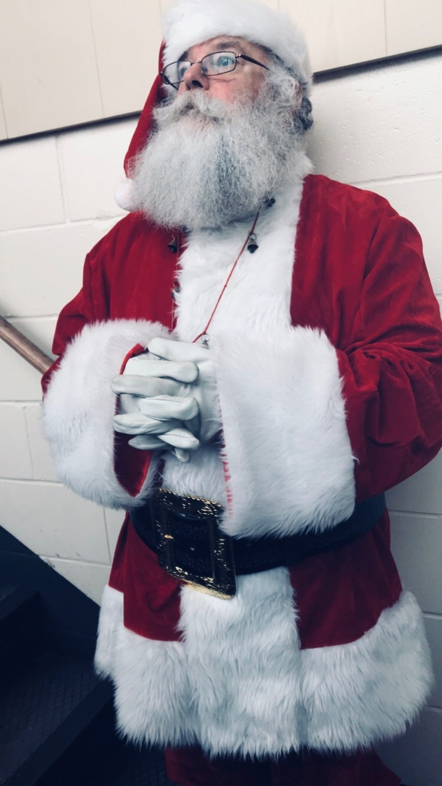 Garrett Veihl poses for a photo dressed as Santa Clause.