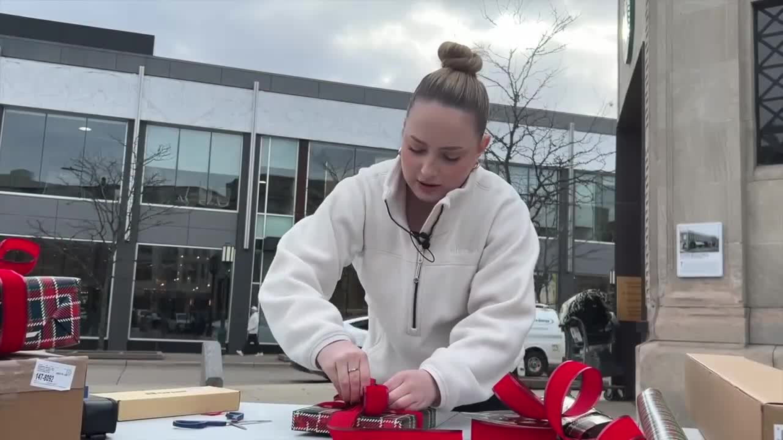 Julia Walker wrapping a gift.