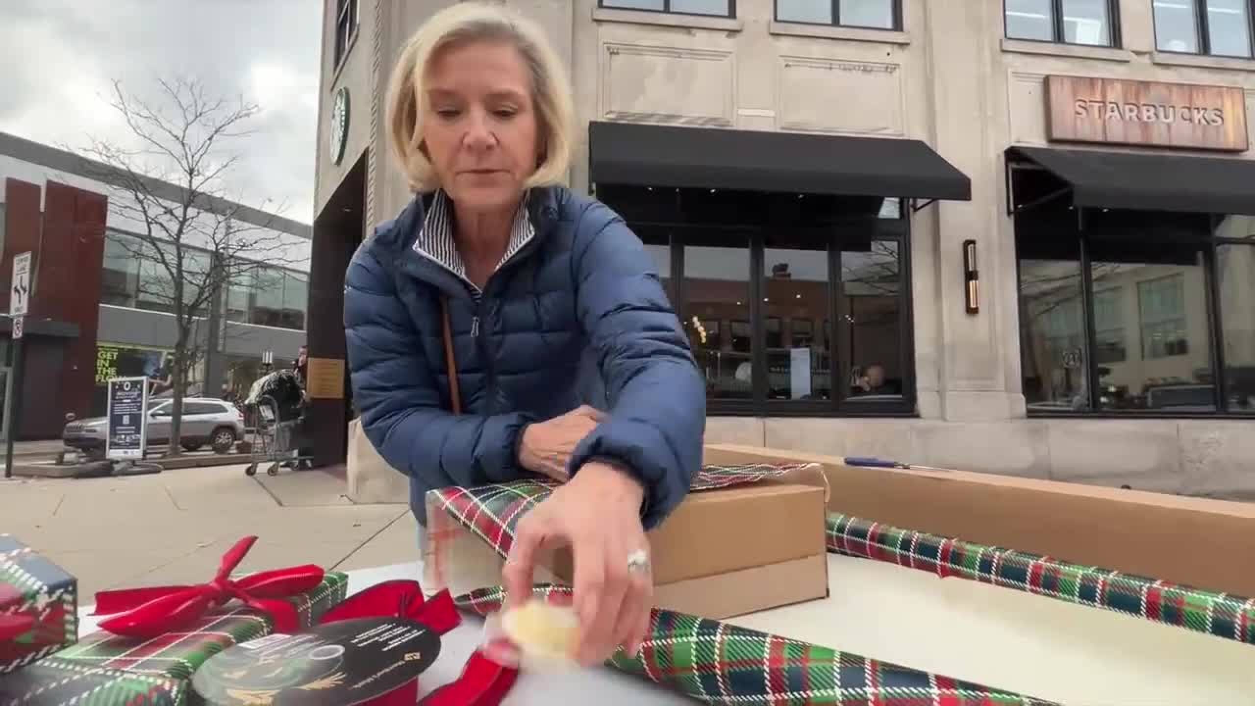 Abby Treat wraps a gift.